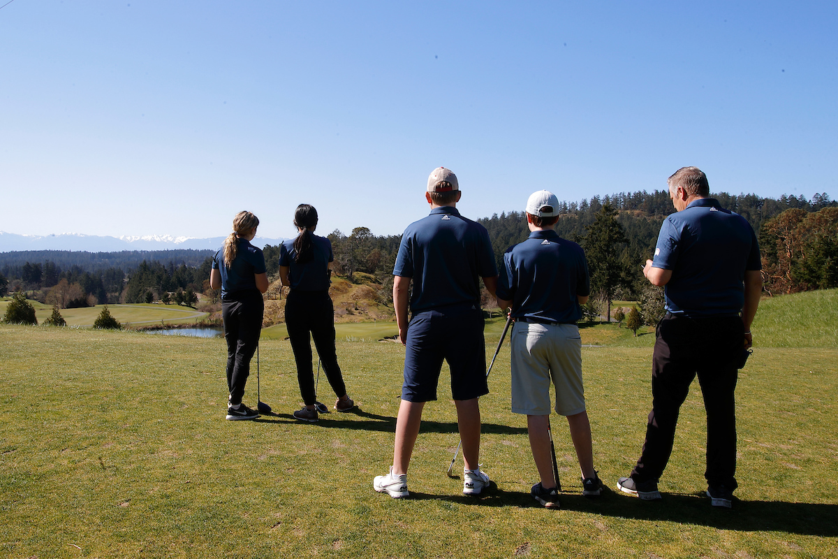 foursome on tee box at HP