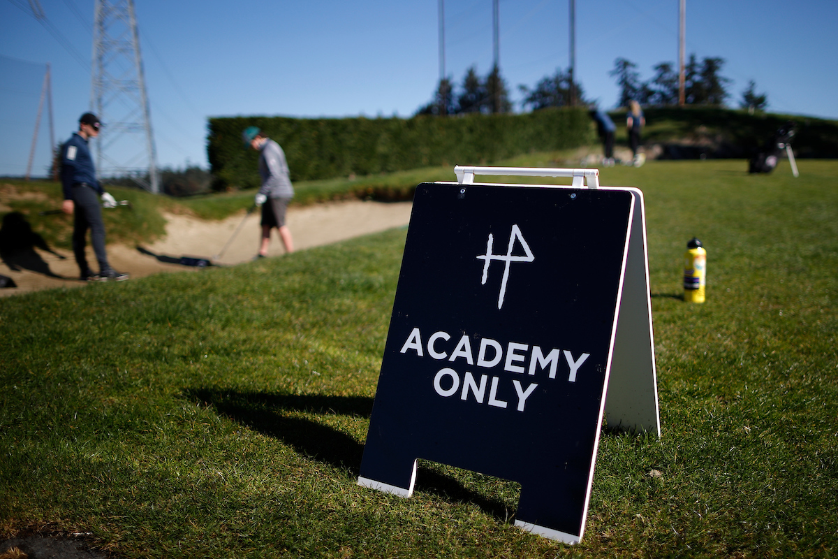 HP sign with students in the background